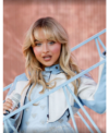 Coachella Music Festival Sabrina Carpenter White and Blue Cropped Leather Jacket Closeup